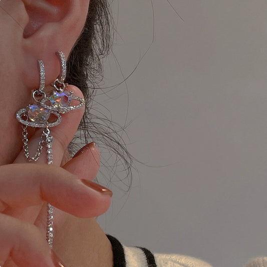 French Saturn earrings set with diamonds and zircons