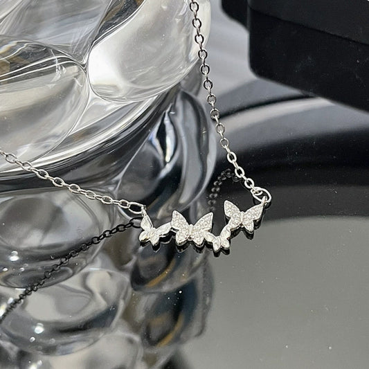 Butterfly diamond and zircon necklace